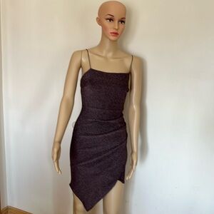 Asymmetric sleeveless dress.